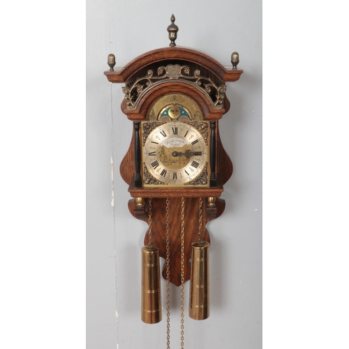 386 - A Thomas Tompion Dutch inspired wall clock. With moon phase.