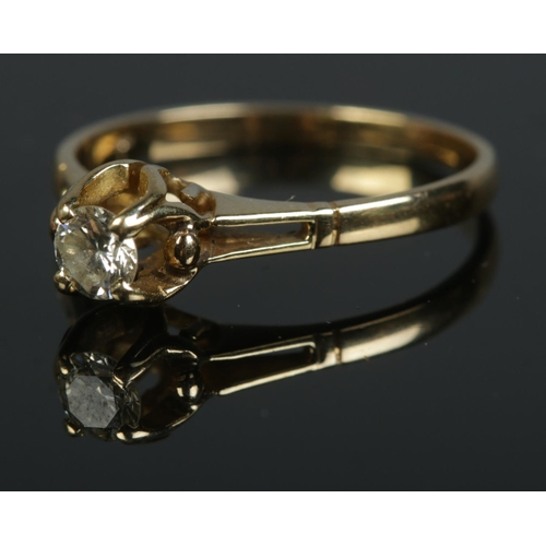 404 - An 18ct diamond solitaire ring. Size P.