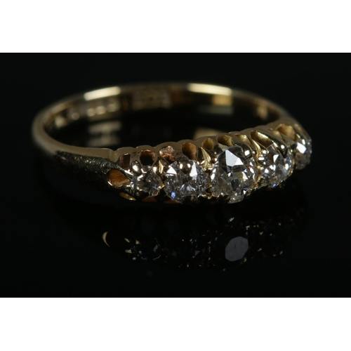 407 - An 18ct Gold and five old stone cut diamond ring. Size K. Total weight: 2.2g