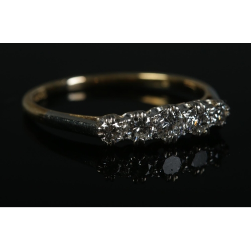 408 - A 18ct Gold and Platinum five stone diamond ring. Size Q. Total weight: 2.2g