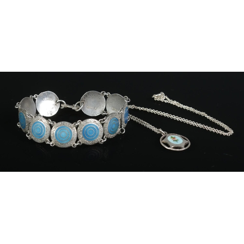 421 - A silver enameled circular pattern bracelet, together with a Charles Horner enameled pendant on silv... 