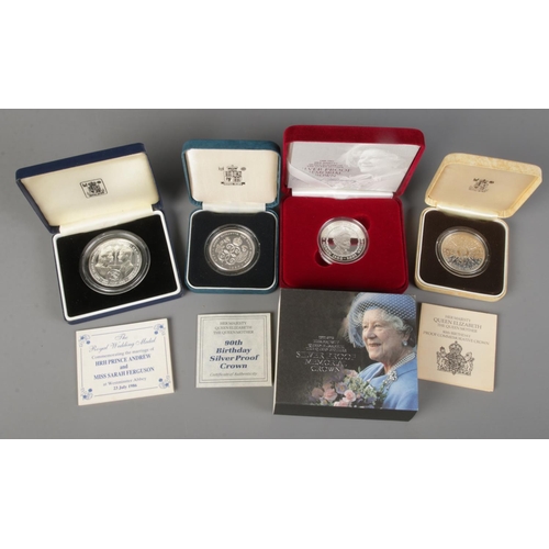 460 - Four cased commemorative Royal Mint silver coins. Includes The Queen Mother Memorial Crown, Marriage... 