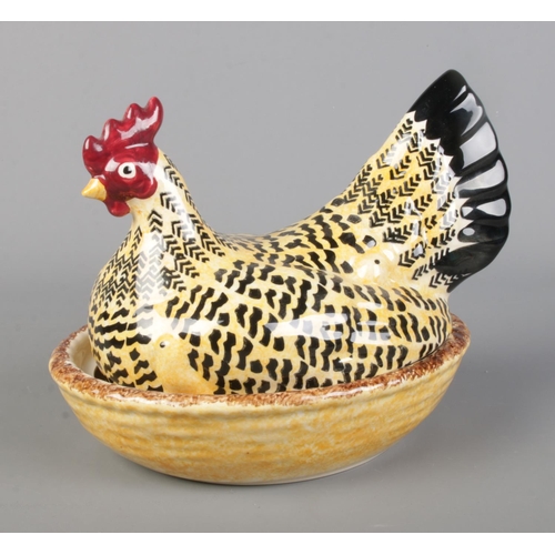 462 - An Emma Bridgewater hen egg basket in the Black Toast pattern.