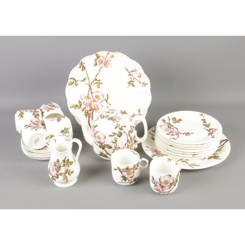 298 - A Crescent and Sons George Jones tea service featuring pink floral decoration. Comprises of tea pot,... 