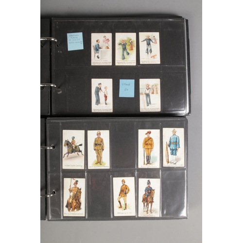 519 - Two folders of incomplete cigarette cards including Modern Armaments, Cairo 