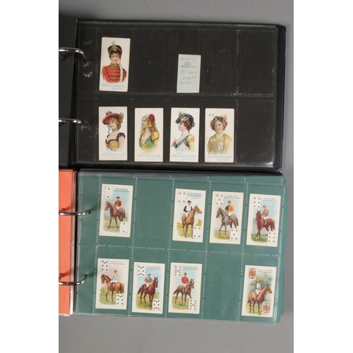 533 - Two folders of incomplete cigarette cards including, Adkin & Sons 