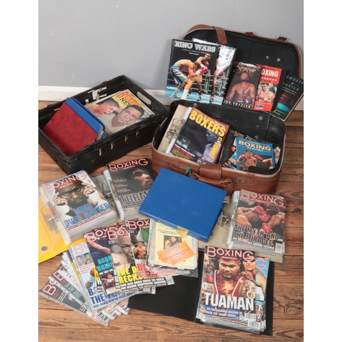 357 - A box and a suitcase containing a large quantity of Boxing magazines and books. Includes Boxing Mont... 