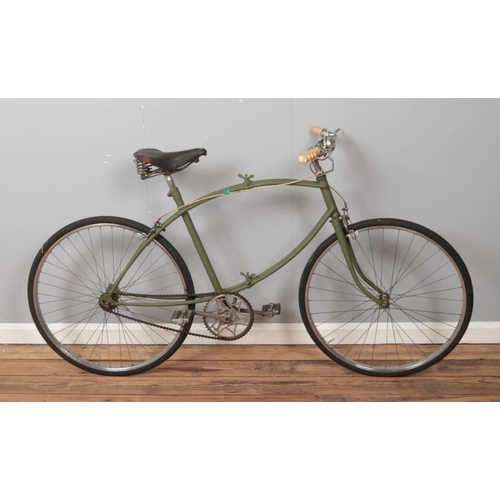 367 - A WW2 era Paratrooper folding push bike with green painted tubular frame with central folding bracke... 