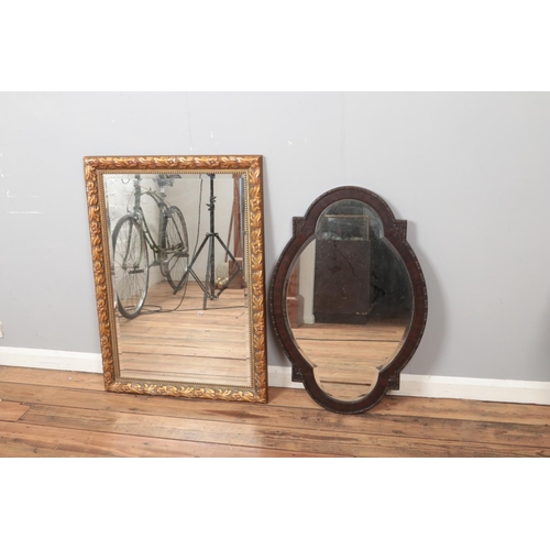 393 - Two large mirrors with bevelled edge glass on with guilt frame.

Largest example 74x102cm