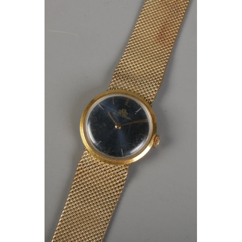 428 - A men's Bucherer wrist watch with yellow metal strap