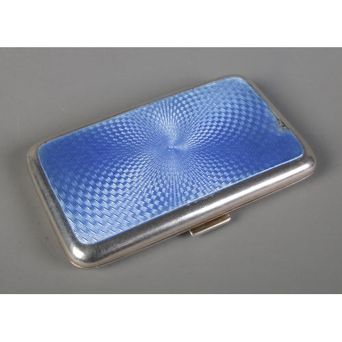 429 - A silver and blue enamel cigarette case, Charles Perry & Co, Chester 1929, 70g, 8cm long.