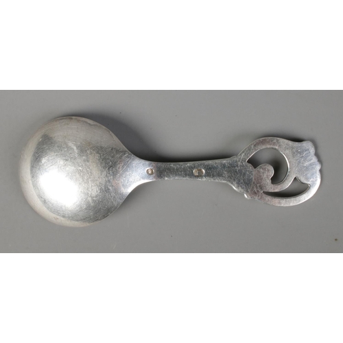 433 - A silver caddy spoon by Johannes Siggaard with Danish three-titre hallmark 1949, 22g.