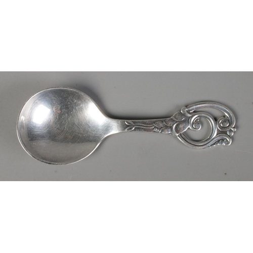 433 - A silver caddy spoon by Johannes Siggaard with Danish three-titre hallmark 1949, 22g.