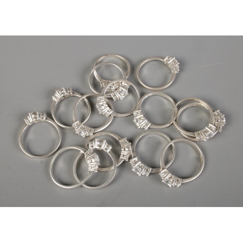 435 - 15 silver three stone Moissanite rings of various sizes