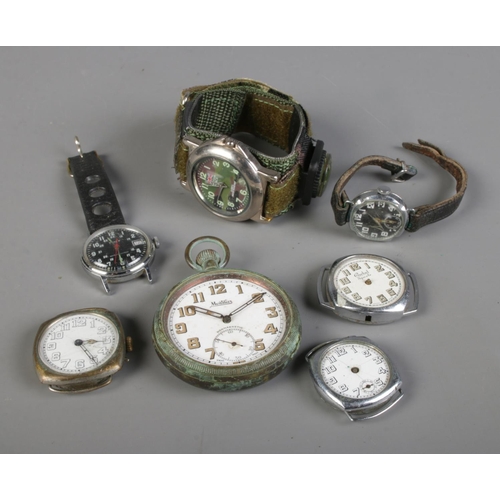 436 - A collection of military style watches