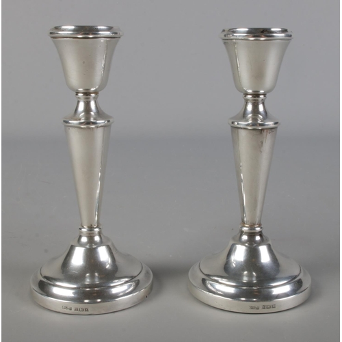 479 - A pair of silver filled candlesticks. Birmingham 1972 J M-A, 318g.

Hx14cm