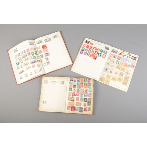 78 - Three albums of stamps including stamps from around the world, historical Nazi Germany stamps and a ... 