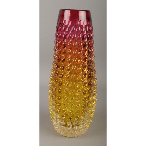 23 - An amberina hobnail glass vase. Approx. height 24cm.