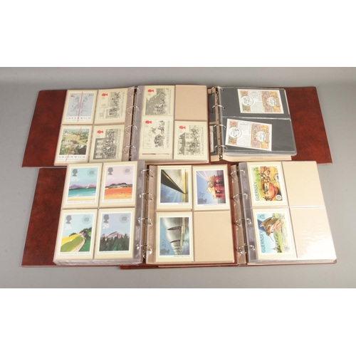 50 - Four albums of mostly modern postcards with varying subjects and locations. Examples include Isle of... 