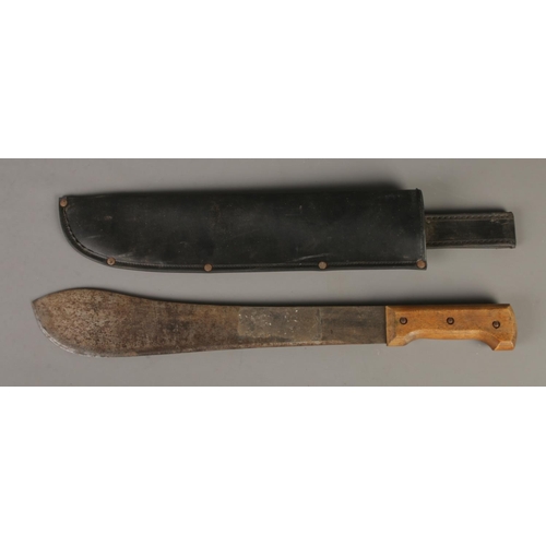 62 - A Tramontina Brasil machete with leather sheath.
CANNOT POST OVERSEAS