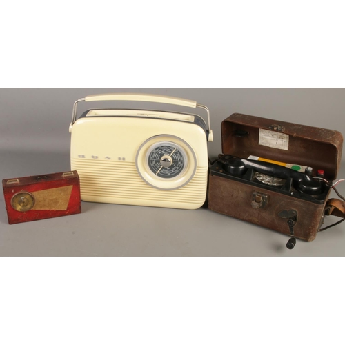 68 - A cased military field telephone along with a Perdio Transistor Super 7 and a Bush radio.