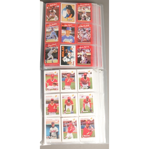 73 - Two full albums of mostly 1990s baseball cards. Includes Topps, Upper Deck, Impel, Score, Nolan Ryan... 