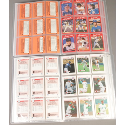 73 - Two full albums of mostly 1990s baseball cards. Includes Topps, Upper Deck, Impel, Score, Nolan Ryan... 