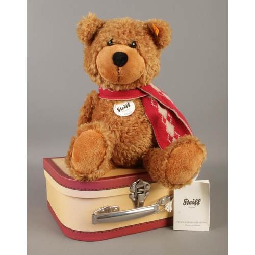 83 - A Steiff 'Charly' bear (113208) with swing tag and button in ear, accompanied by the original small ... 