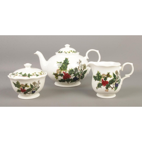 86 - Portmeirion; The Holly and The Ivy, three piece tea set. Comprises of teapot, cream jug and covered ... 