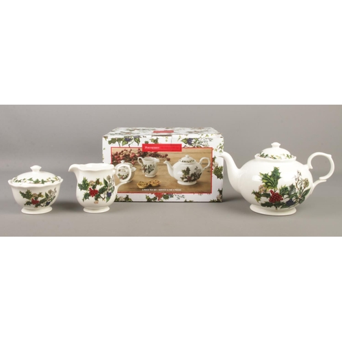 86 - Portmeirion; The Holly and The Ivy, three piece tea set. Comprises of teapot, cream jug and covered ... 