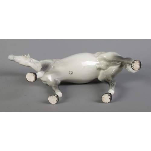 408 - A large Beswick horse in dapple grey, model 1564. Height 28cm.