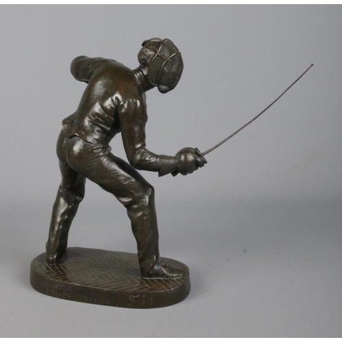 113 - After Benedict B Rougelet, a pair of bronze fencers, signed F Lombard. Height 28cm.