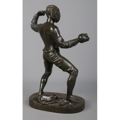 113 - After Benedict B Rougelet, a pair of bronze fencers, signed F Lombard. Height 28cm.