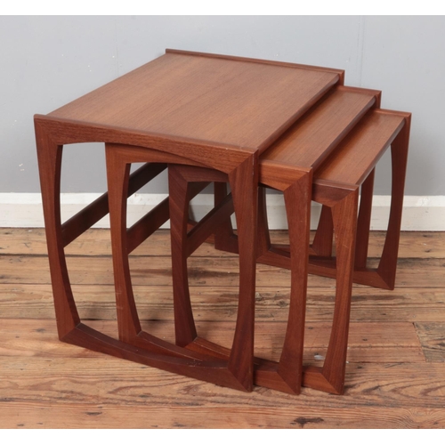 454 - A teak G Plan Quadrille design nest of three tables.