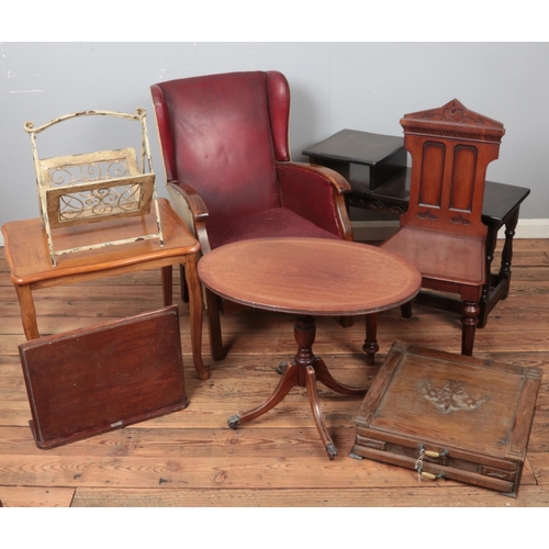 457 - A quantity of furniture. Includes carved mahogany hall chair, Regency style coffee table, wingback a... 