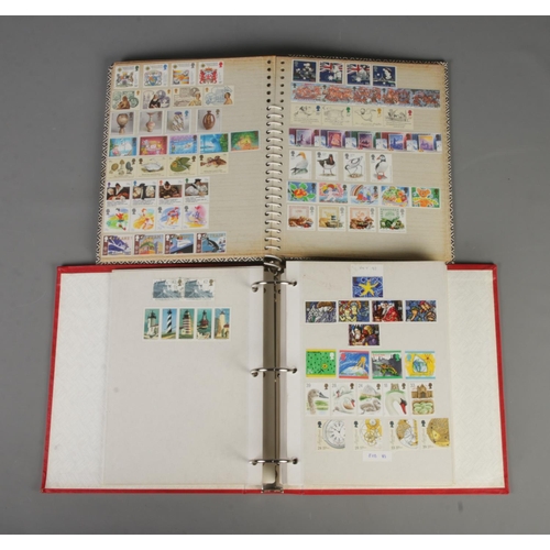 129 - Two partly filled folders of Royal Mail unfranked, unused commemorative stamps. Examples include Cha... 