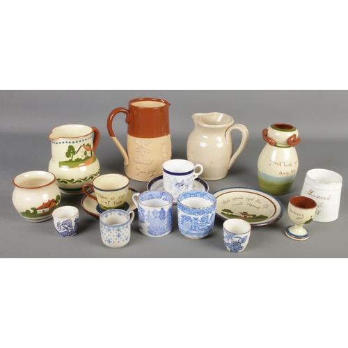 173 - A quantity of ceramics. Includes Doulton Lambeth jug, motto ware, blue & white cups & saucers, Royal... 