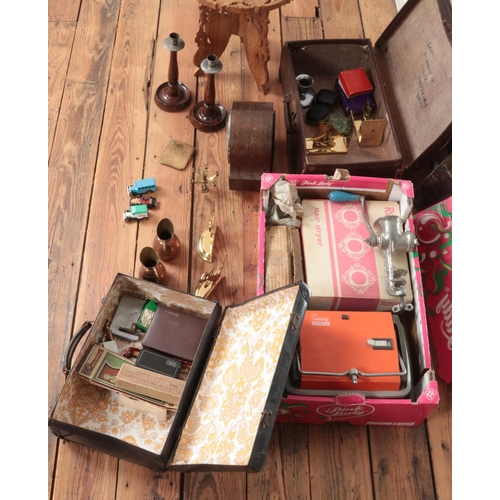 193 - One box and two small vintage suitcases of miscellaneous to include Indian brass bookends, assorted ... 