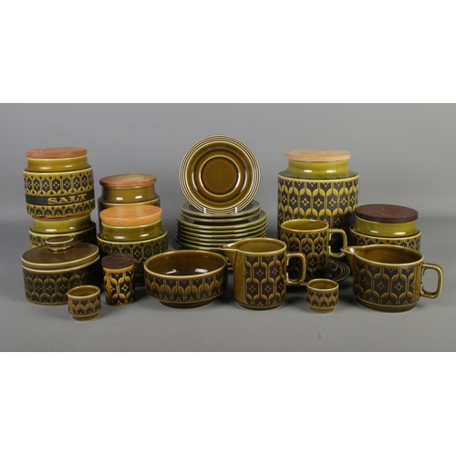 194 - A collection of Hornsea dinnerwares in the Heirloom pattern. Includes storage jars, plates, eggcups ... 