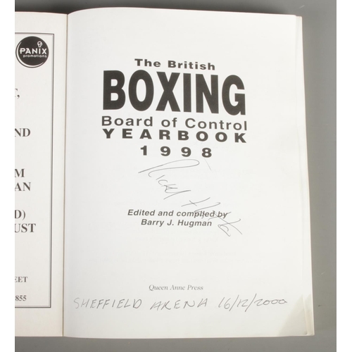 200 - A box and a suitcase containing a large quantity of Boxing magazines and books. Includes The British... 