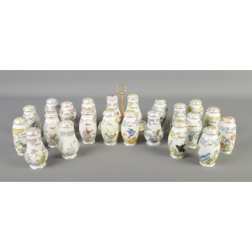 37 - A large quantity of Lenox porcelain storage jars, Birds and Blossoms.