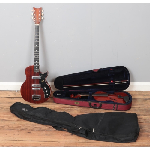 225 - A Kay electric twin pick up guitar (model KJP-2) along with cased student violin with bow.