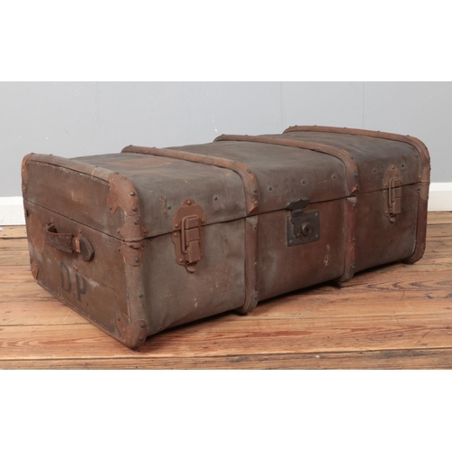 231 - A collection of vintage trunks and suitcases, to include wooden bound trunk and 1964 military ammuni... 