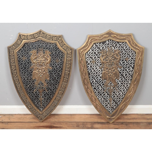 236 - A pair of large vintage wooden shields, theatre props/re-enactment shields. 

Hx91cm