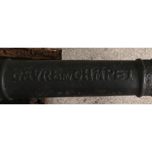 246 - A decorative iron French saluting cannon marked 'Gavre Av Ghapet' raised on wooden stand. Length of ... 