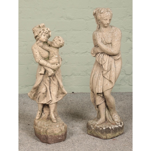 248 - Two cast concrete garden statues. One formed as a maiden, the other of a girl holding a baby. Height... 