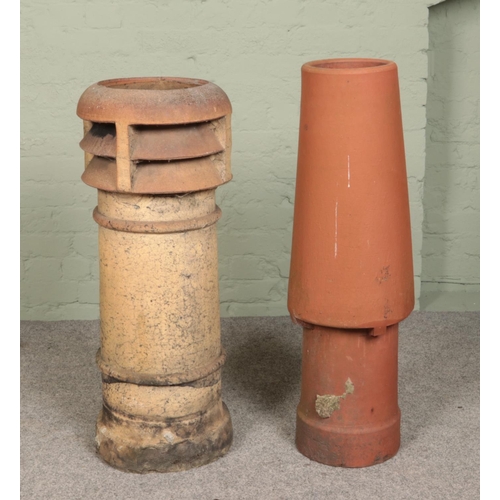 261 - Two terracotta chimney pots, one with vented top. Tallest 97cm.