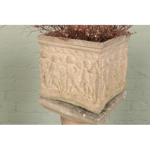 270 - A Corinthian style garden pillar, with square foot and base, with a small cube garden planter depict... 