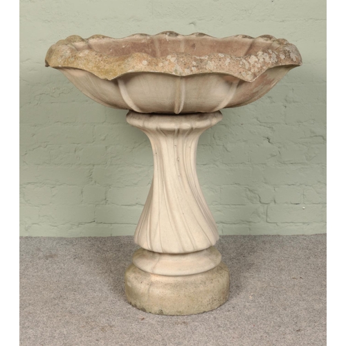 280 - A very large birdbath/planter on twisted pedestal base and flared top. Height: 91cm, Width: 70cm.