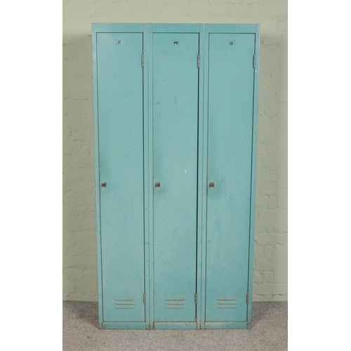 281 - A lockable three section gun cabinet/locker, with keys to each section. Height: 178cm, Width: 91cm.